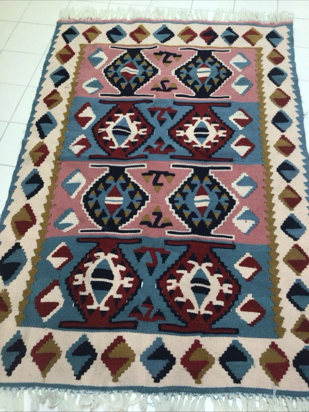 Handwoven rug kilim, wool, Aztec pattern Southwestern, fringes, 32” x 52”